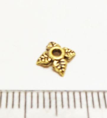 Four leaf bead caps x 30. 5mm. Gold