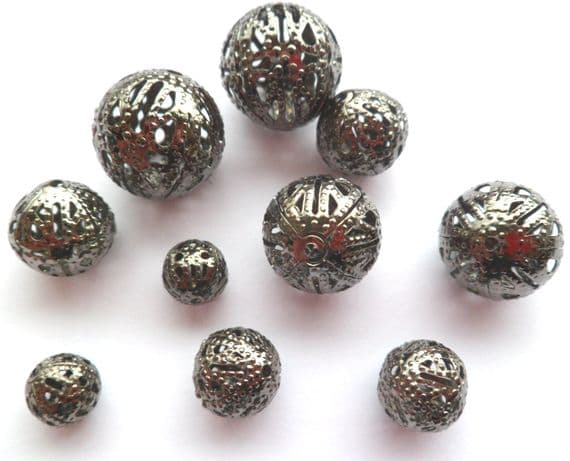 Hollow spacer bead x 10. 3 sizes. 9mm - 15mm. Black.