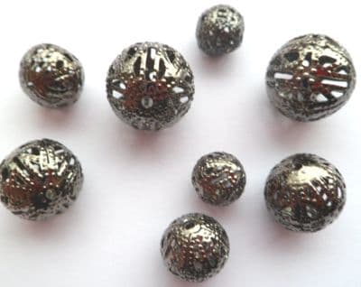 Hollow spacer bead x 8. 4 sizes. 9mm - 15mm. Black.