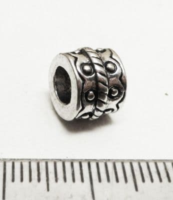 Large hole dotted bead 9mm x 7mm with 4mm hole