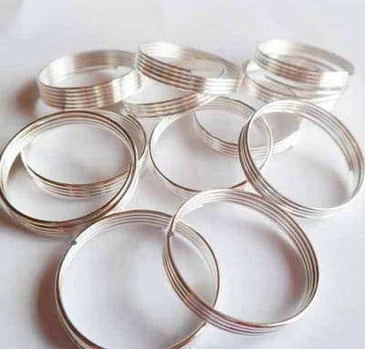 Memory wire 4 coil  ring x 12. 20mm diam.
