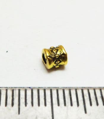 Mini tube spacer x 80. Gold. 3.5mm x 2.5mm.