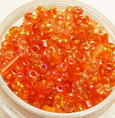 Orange seed beads with 9mm tubes. 10g pack