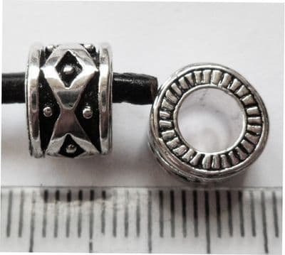 Single bead with large 4.7mm hole. 9mm x 6.5mm