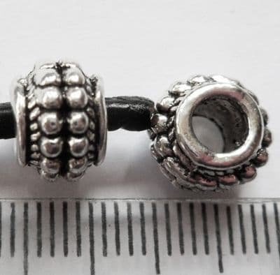 Single large hole bead. 9mm x 7mm. Hole 4.5mm