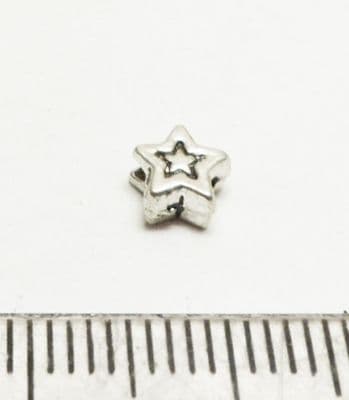 Star spacer beads x 30. 5mm.