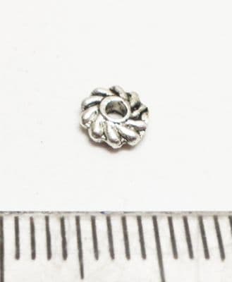 Swirl Disc spacer bead. 5mm x 40