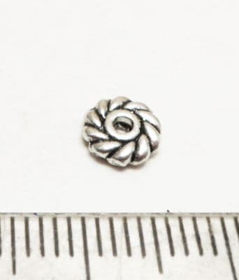 Swirl disc spacer bead. 6mm x 30.