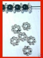 Tibetan Style daisy spacer. 100 x 4mm.Pick a colour.