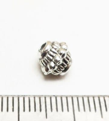 Tibetan Style Silver dotted bicone beads x 14. 7mm.