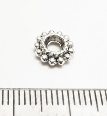 Tibetan Style Silver Dotted twist rings.x 20. 9mm.