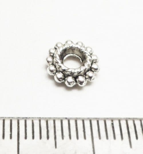 Tibetan Style Silver Dotted twist rings.x 20. 9mm.