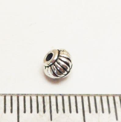 Tibetan Style Silver mini barrel bead x 25. .4.5mm