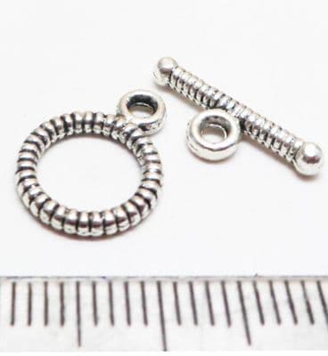 Tibetan Style Silver Twist Toggle/bar x 10. 10mm x 1.5mm. 10mm diam