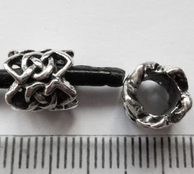 Tube bead with 4.5mm hole. 9mm x 8mm. Tibetan Silver