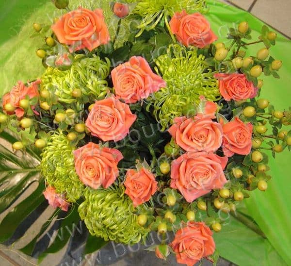 Colorful bouquet in a monstera leaf