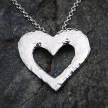 Pierced heart pendant P97