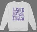 Love Never Fails Purple text  sweatshirt