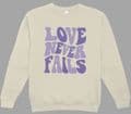 Love Never Fails Purple text  sweatshirt