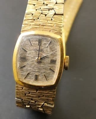 IMADO Ladies one piece gold effect watch running needs clean and service