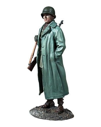 WB25257 - U.S. Infantryman Standing with Raincoat over Equipment