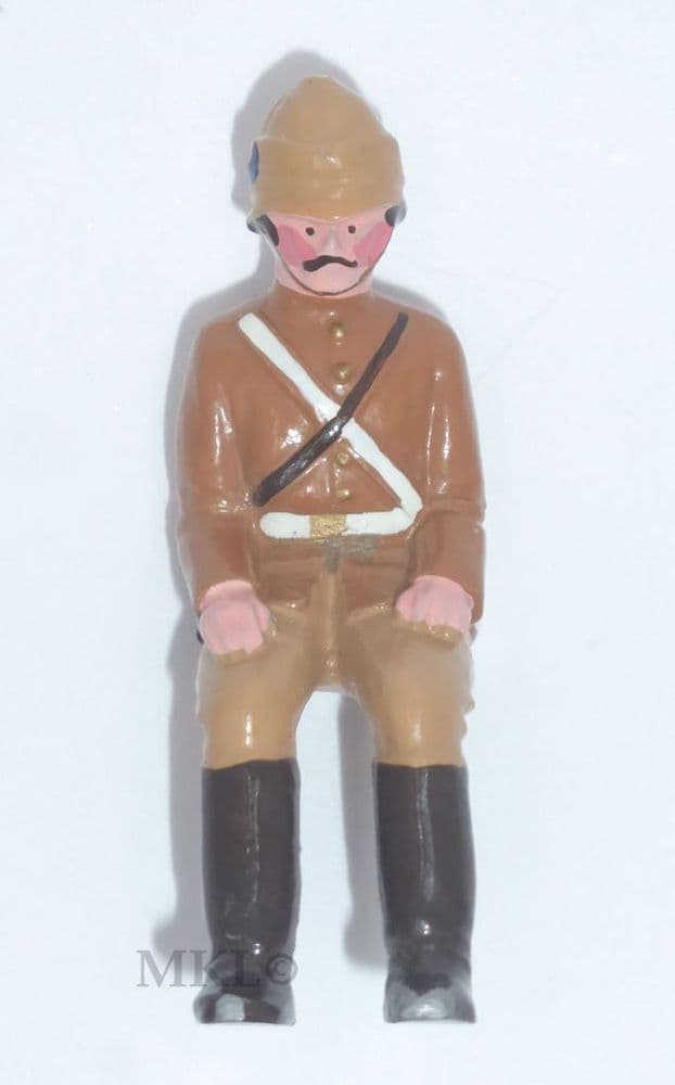 Trophy Miniatures Seated Figure U ( Brown strap across chest)