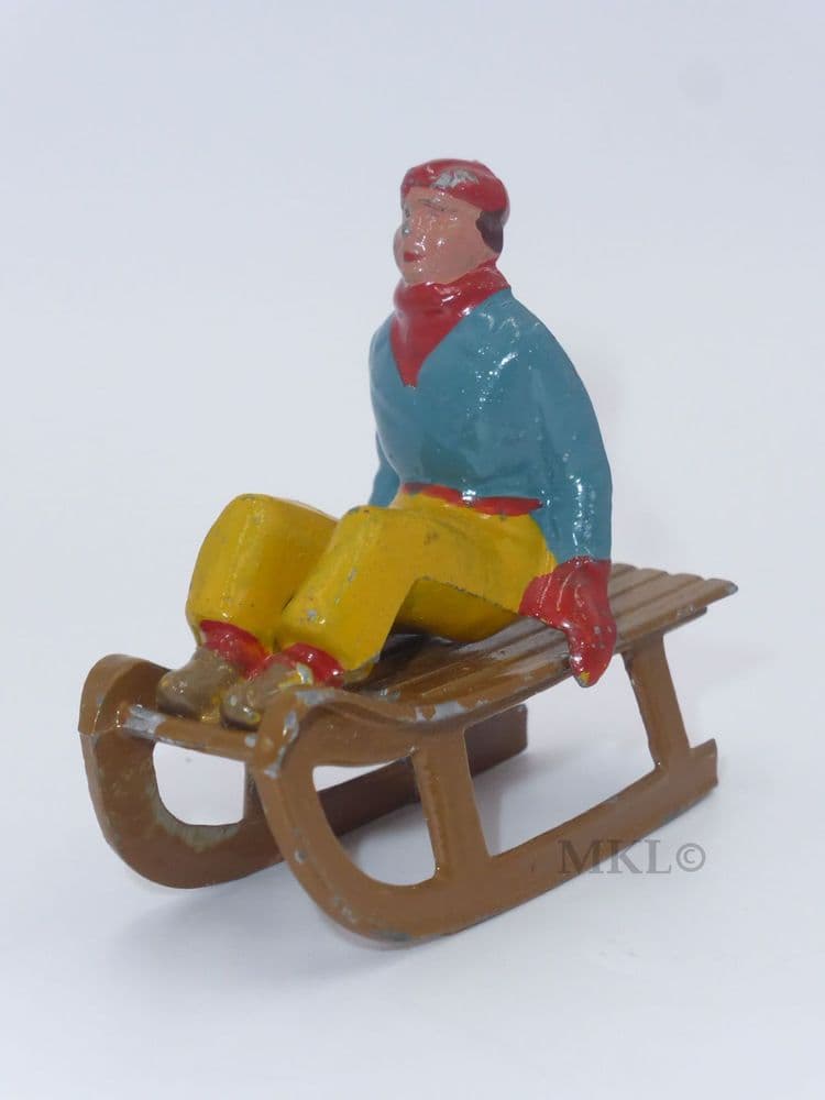 Vintage Lead Figure - Person Sitting on Sled