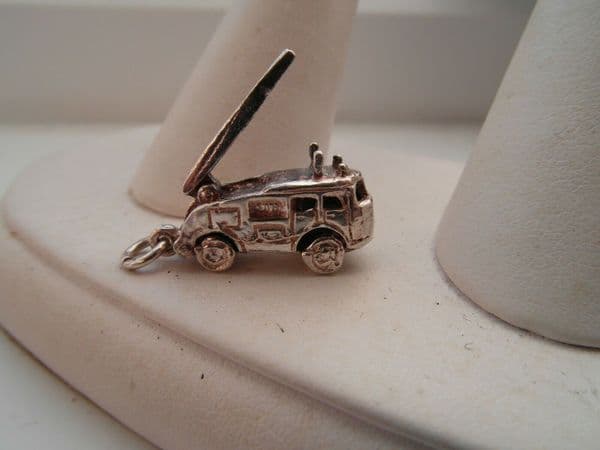 5n silver vintage traditional fire engine charm with a moveable ladder.