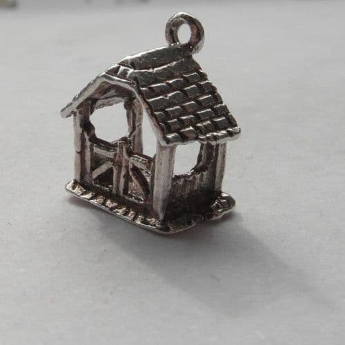 antique vintage charm of a stable for a traditional charm bracelet