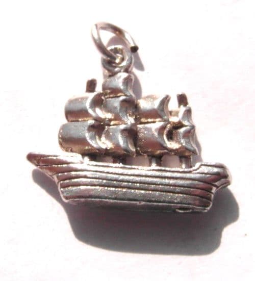 Old antique vintage silver charm of a sailing pirates ship for a charm bracelet