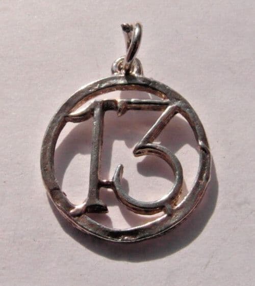 old vintage silver charm of a 13 charm for a charm bracelet