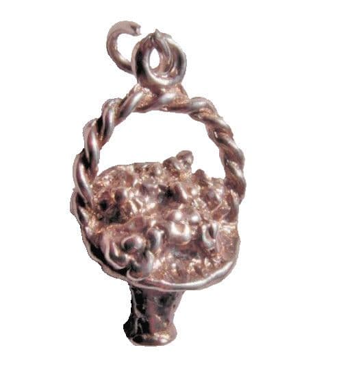 old vintage silver charm of a basket of flowers for a traditional charm bracelet