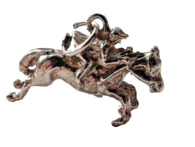 old vintage silver charm of a racing horse with a jockey for a charm bracelet
