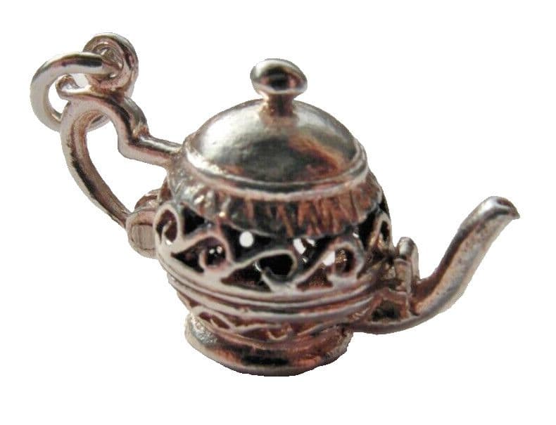 old vintage silver charm of a teapot with opening feature for charm bracelet