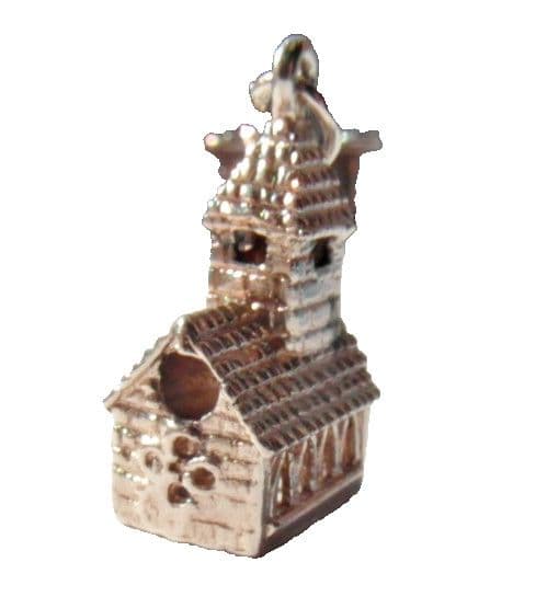 old vintage silver charm of a traditional church for a charm bracelet