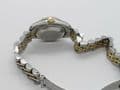 Q216 Ladies 18k gold and steal rolex oyster date watch with papers near mint
