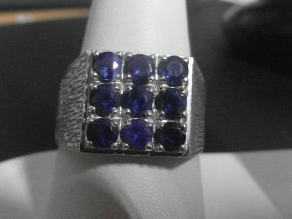 Q86 - Gents 14K White Gold ring with 1.35K Clear Blue Ceylon Sapphire