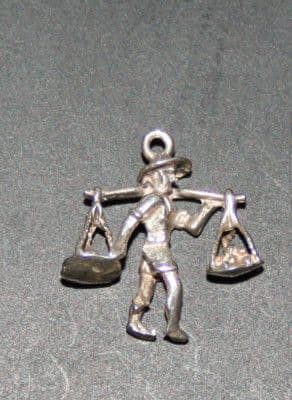 SOLID SILVER CHINESE MAN CARRYING FOOD CHARM