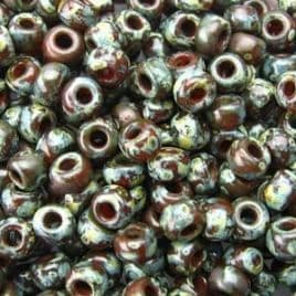 4503 SEED BEADS 8/0 PICASSO TRANSP RED BROWN
