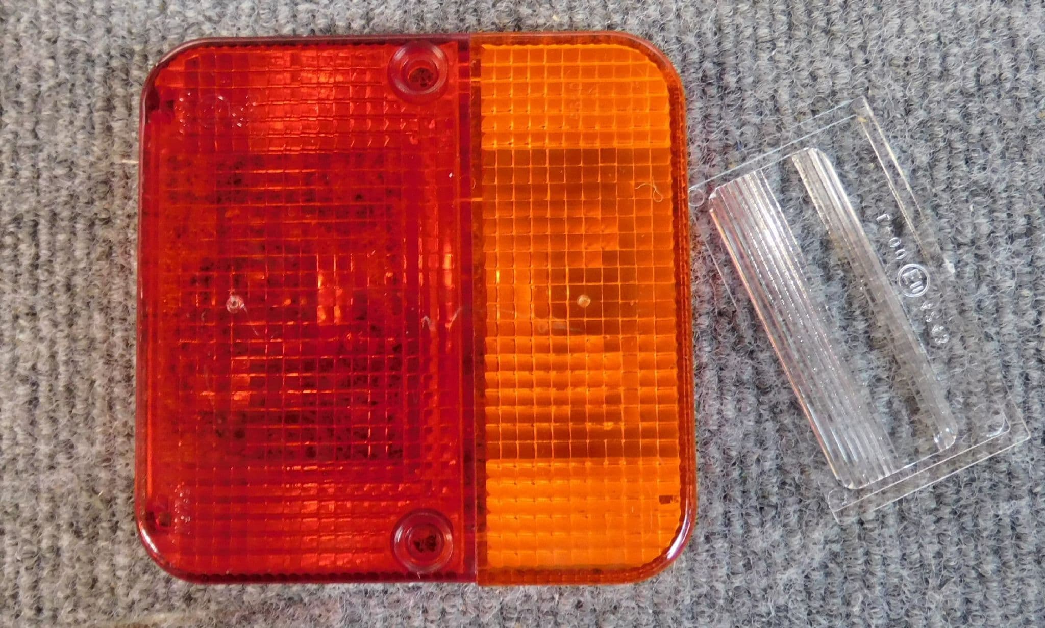 Trailer board light lens