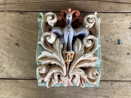 19th century architectural polychrome carving of a peacock