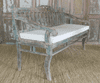 antique indian teak wood bench with faded paint tones & cushion