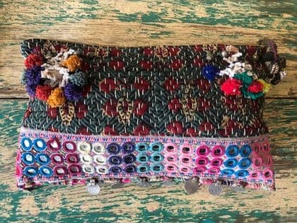 antique textile bag with mirror work and coins