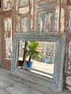 Bevelled mirror made from a Merchant's House Window with faded blue paint tones