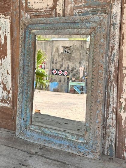 Bevelled mirror made from a Merchant's House Window with faded blue paint tones