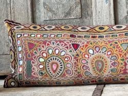 Bolster Cushion made from a Vintage Embroidered Toran  backed in  Antique Linen
