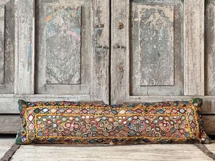 Bolster made from a Vintage Mirrorwork Embroidered Toran, Gujarat SOLD