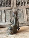 Bronze Buddha depicted at the moment of Enlightenment Under the Bodhi Tree