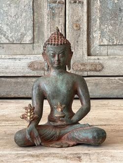 Bronze Buddha in Meditation Pose with Lotus Flower