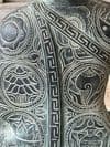 Bronze Buddha with etched decorative robes & hand mudra in the Abhaya fearlessness pose